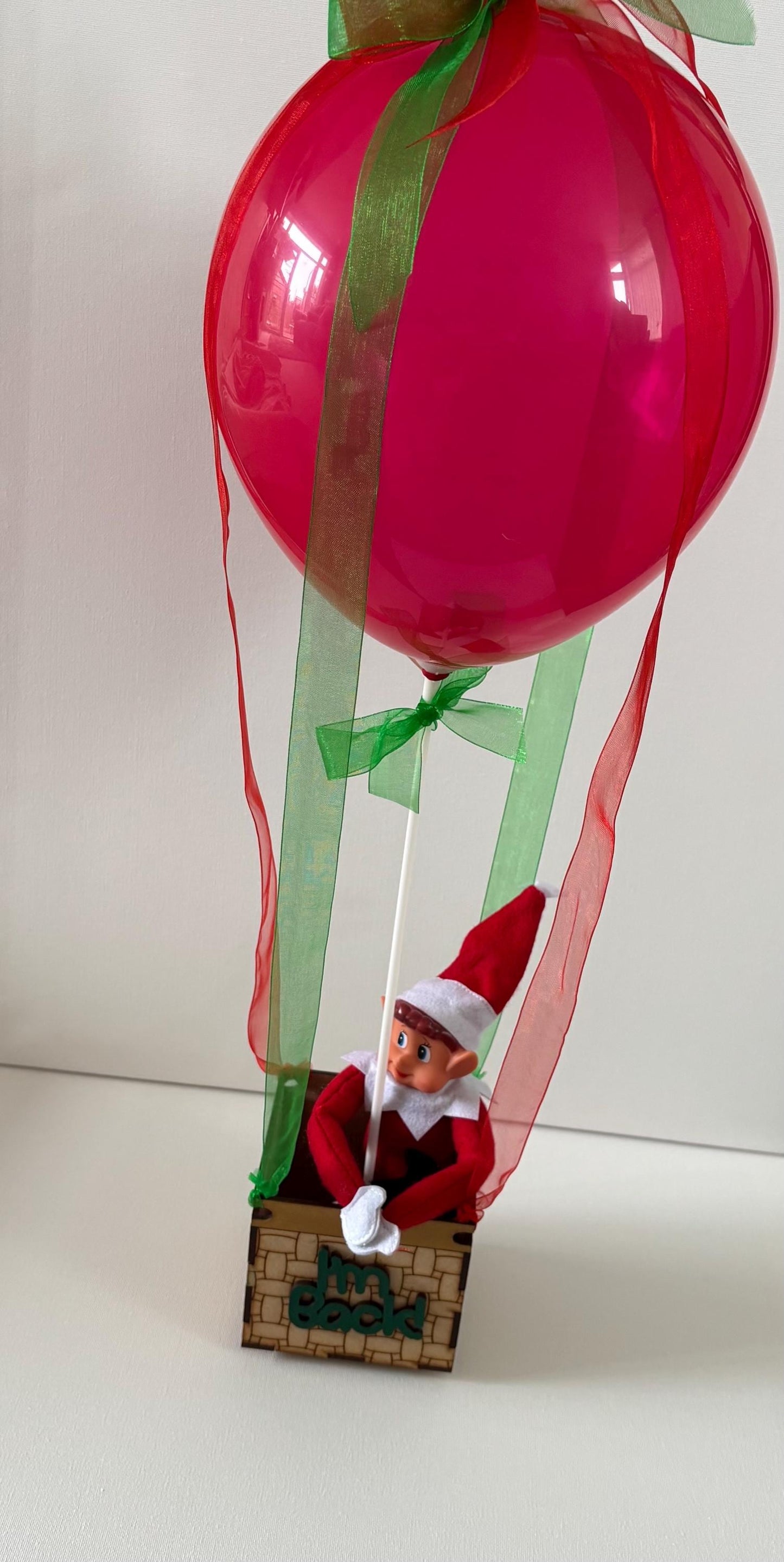 Christmas elf arrival hot air balloon