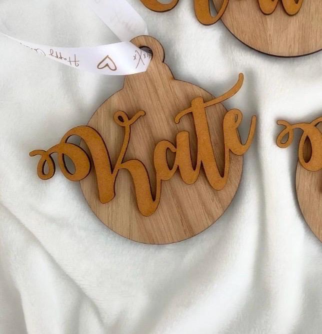 Personalised wood veneer family name bauble